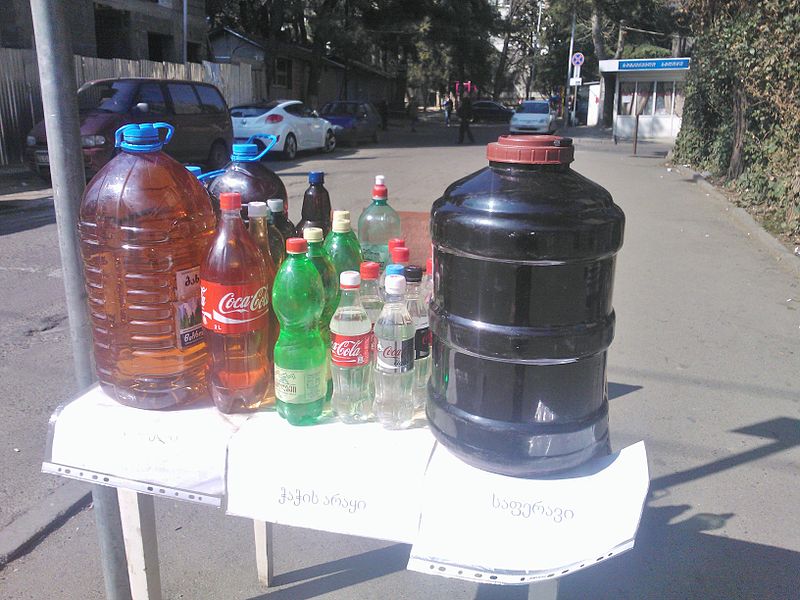 home made wine in plastic bottles